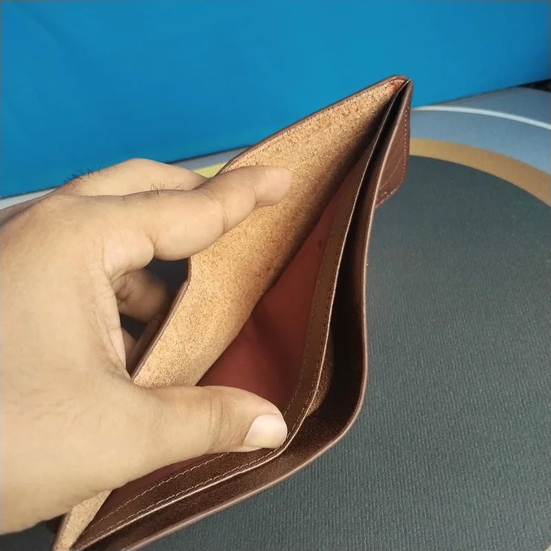 Elegant brown color pure leather bi-fold wallet